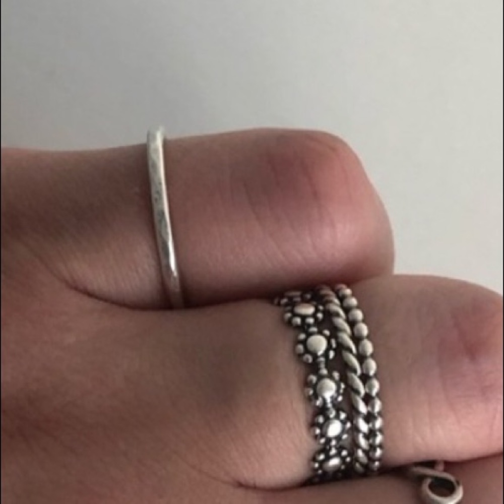 4 sterling silver rings (size 7 and 7.5)